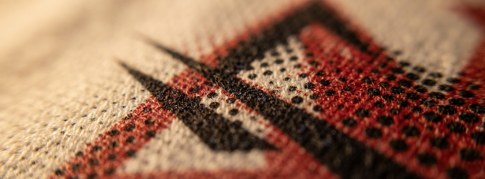 Close-up of halftone dot patterns used in simulated process color separation for a full-color design